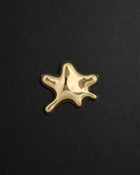 Water-shaped 18K gold pendant on a black background