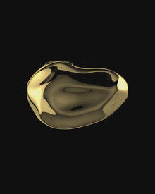 Pomegranate-shaped 18K gold pendant on a black background